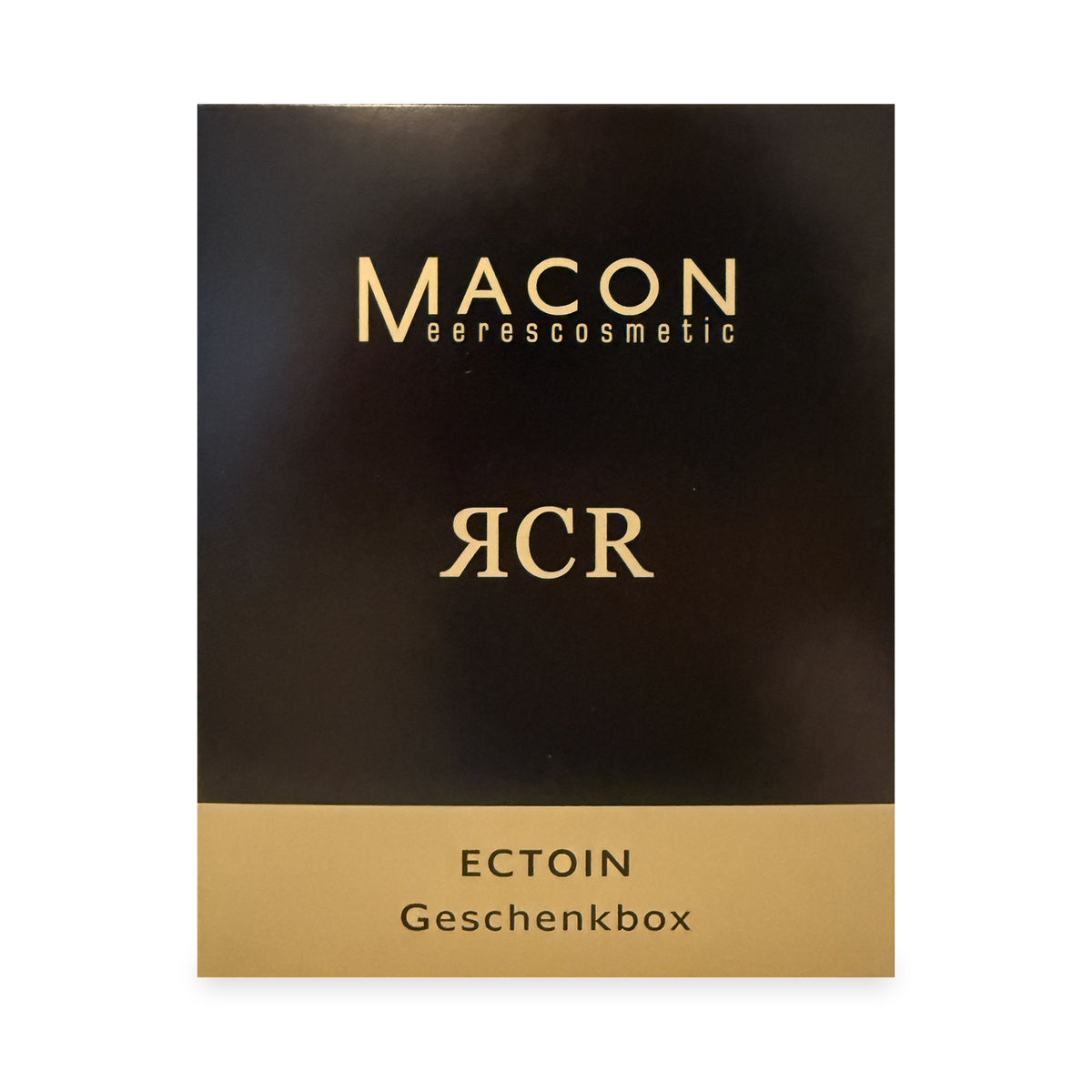 MACON RCR Ectoin Geschenkbox – schwarze Geschenkbox mit goldenem Band auf weißem Hintergrund